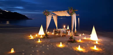 An intimate dinner on the beach at Melati Beach